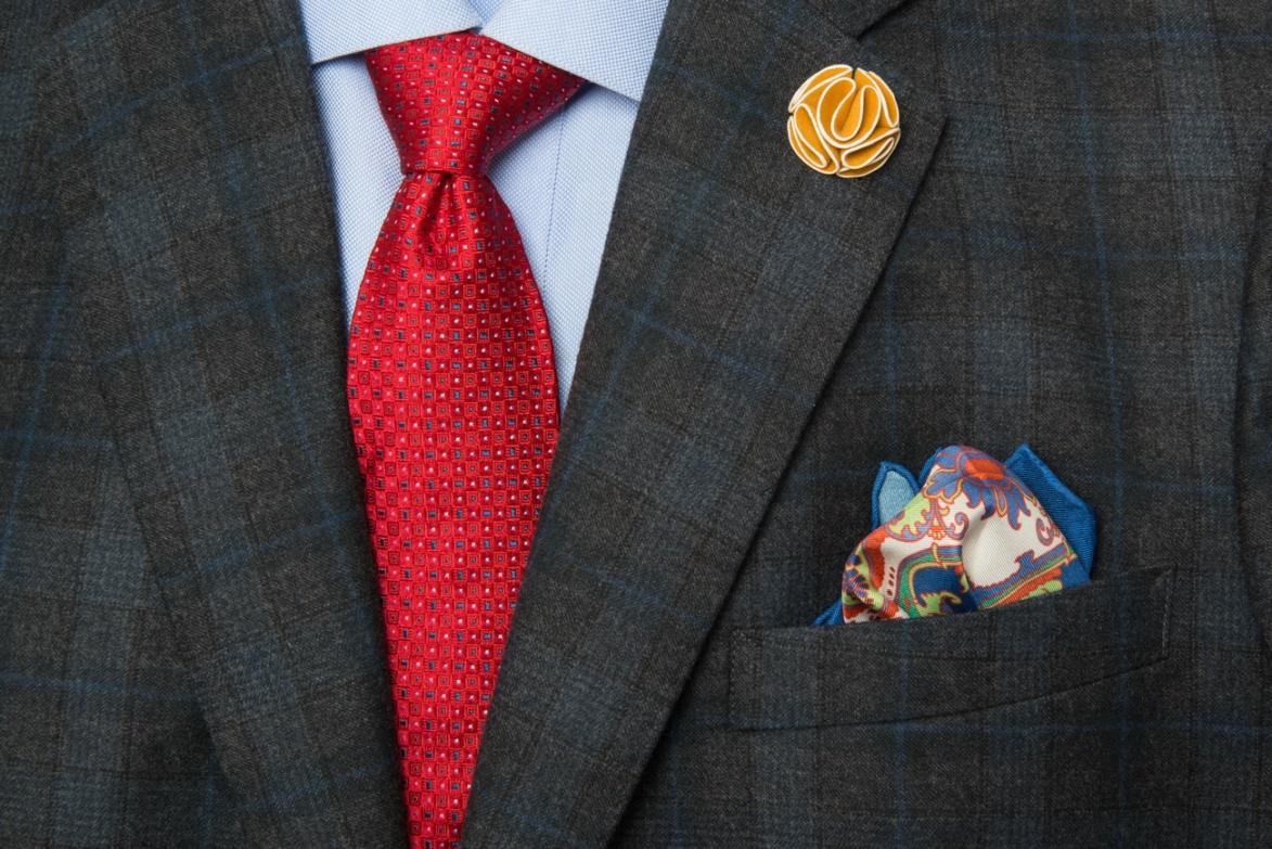 The Dark Knot’s Stafford Squares Red tie helps to create a sense of authority and power 