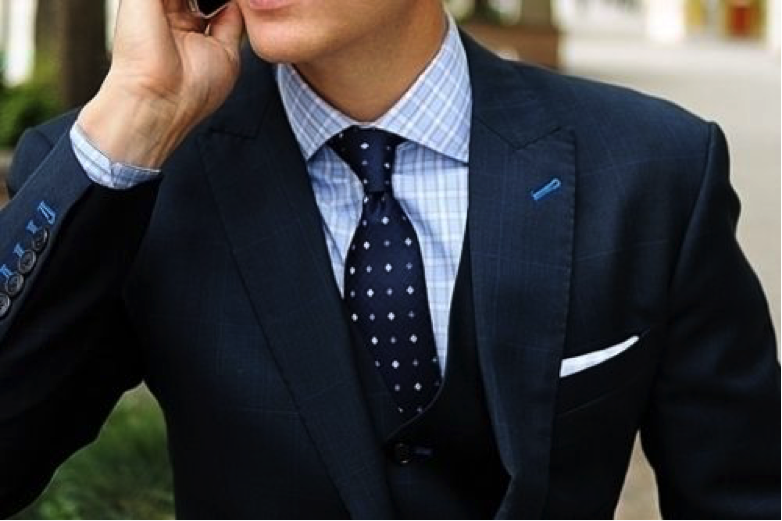 polka dot tie with a checkered shirt
