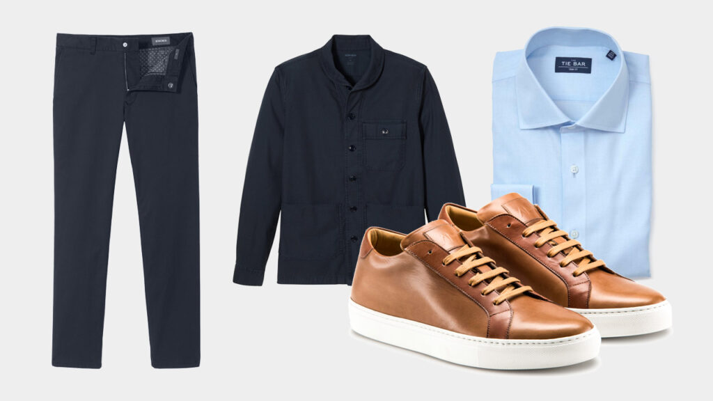 smart sharp casual outfit with Ace Marks brown dress sneakers, navy chinos, navy chore coat, and light blue dress shirt