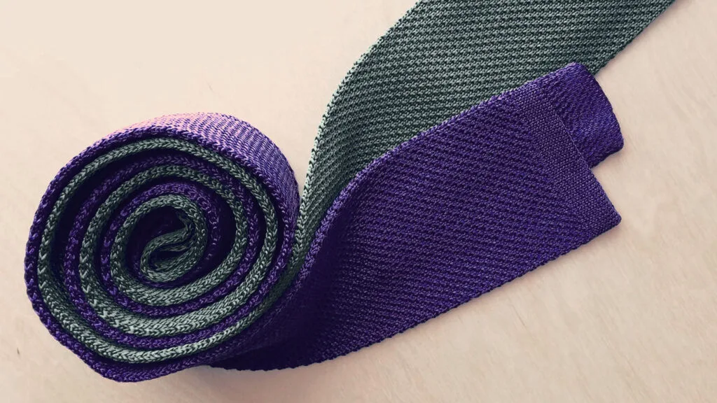 how to store ties - rolled up knit ties in grey and blue purple