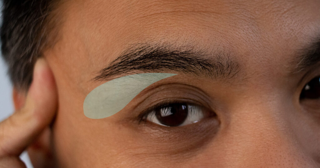 closeup of eyebrow area to pluck for men