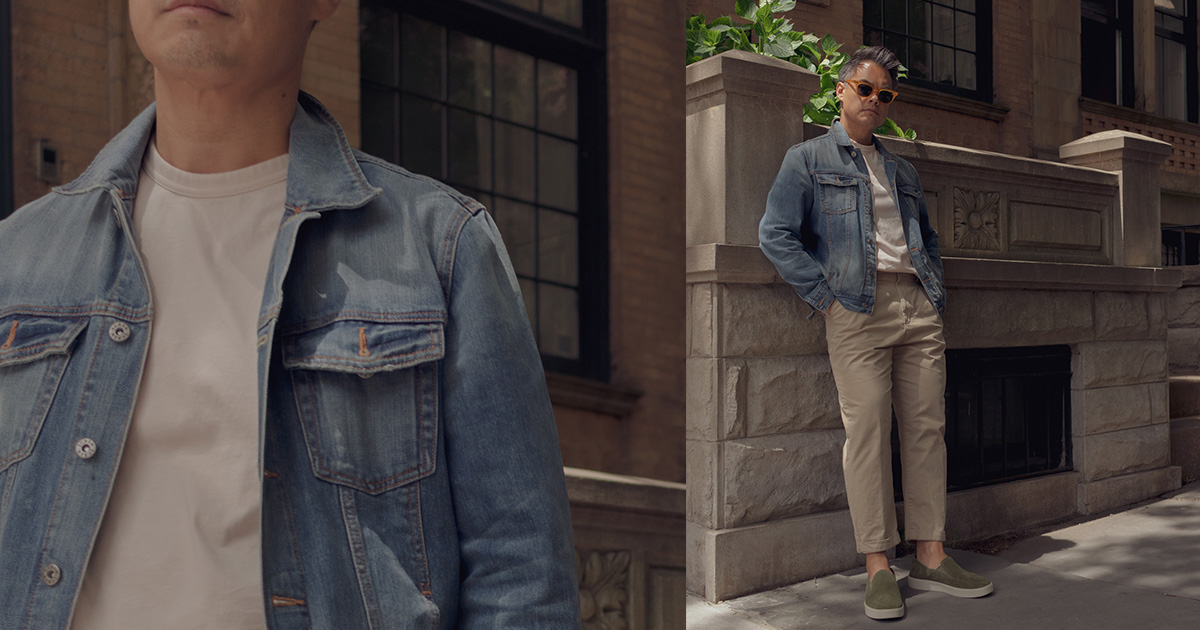 an example of a great men's spring outfit: chinos, a tucked-in T-shirt, denim jacket, and slip on shoes